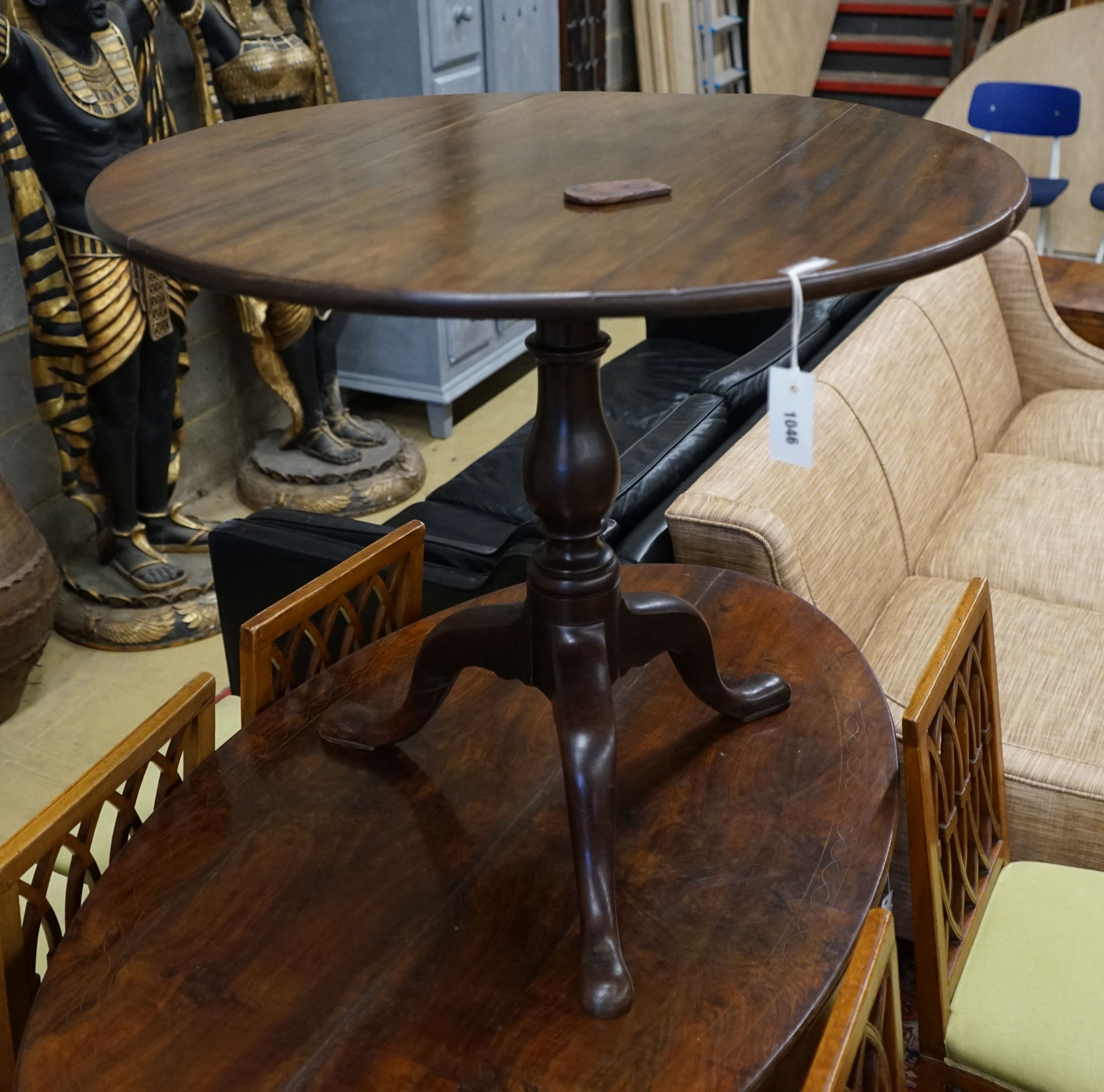 A George III circular tilt top tripod tea table, diameter 86cm, height 72cm